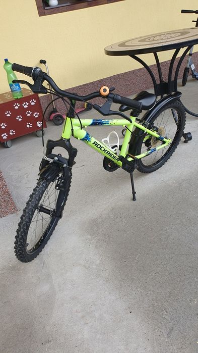 Vând bicicleta în stare impecabila cu roti de 20pentru copii