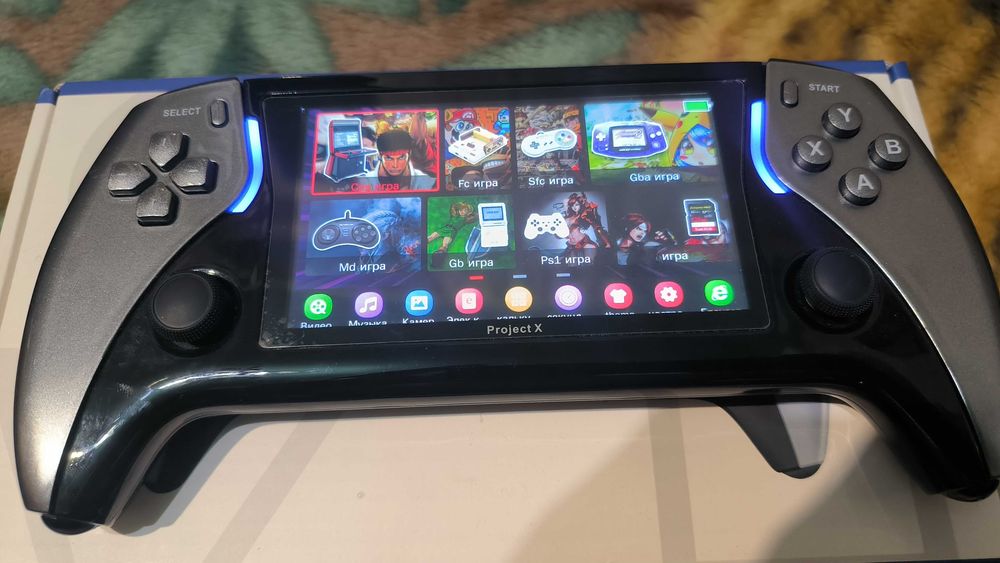Продам портативную консоль Project X.