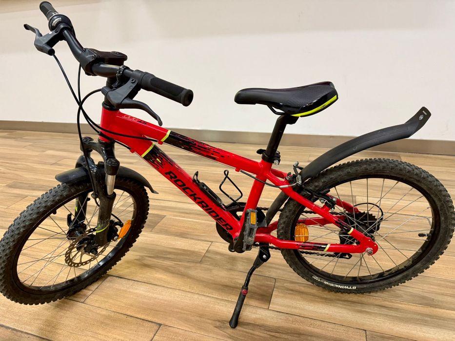 Vand bicicleta Rockrider 20', suspensie hidraulica fata, frâne pe disc, copii 5-8 ani, 900 RON