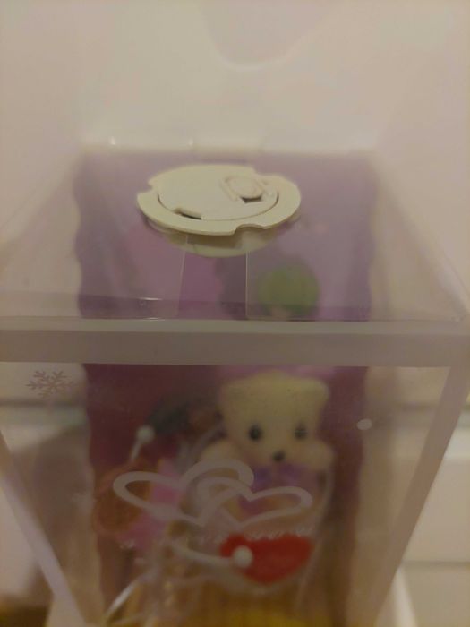 Cutie cadou cu ursulet pe bicicleta cu instalatie