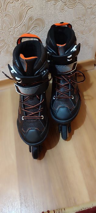 Роликовые коньки