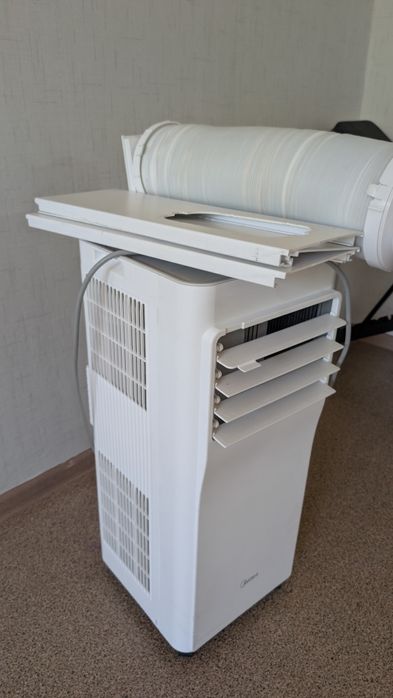 Напольный кондиционер Midea