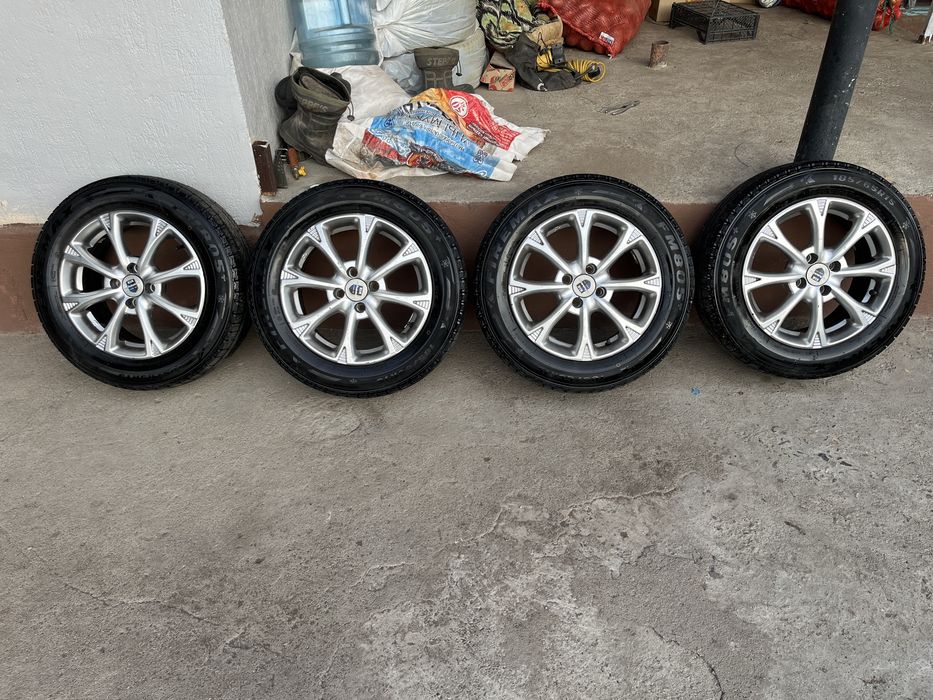 Продам зимние шины с дисками 185/65 R15