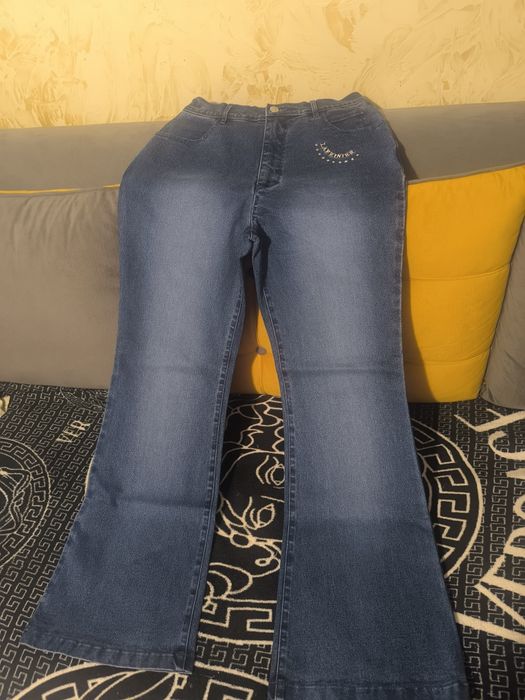 Джинсы клёш 46-48.