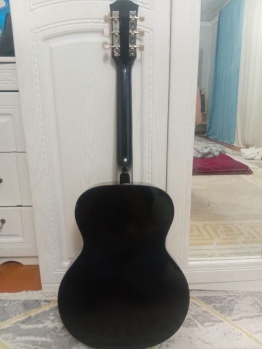 Гитара инструмент