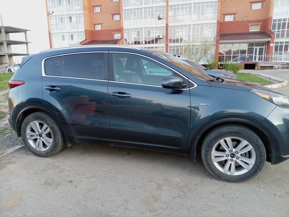 > автомобиль Киа Спортейдж 2016 г