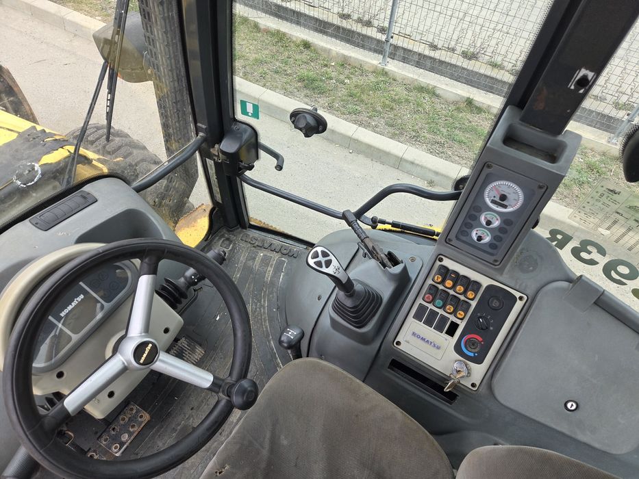 Buldoexcavator komatsu  WB 93 R AN 2011