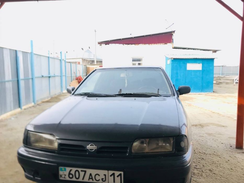 Ниссан примера .