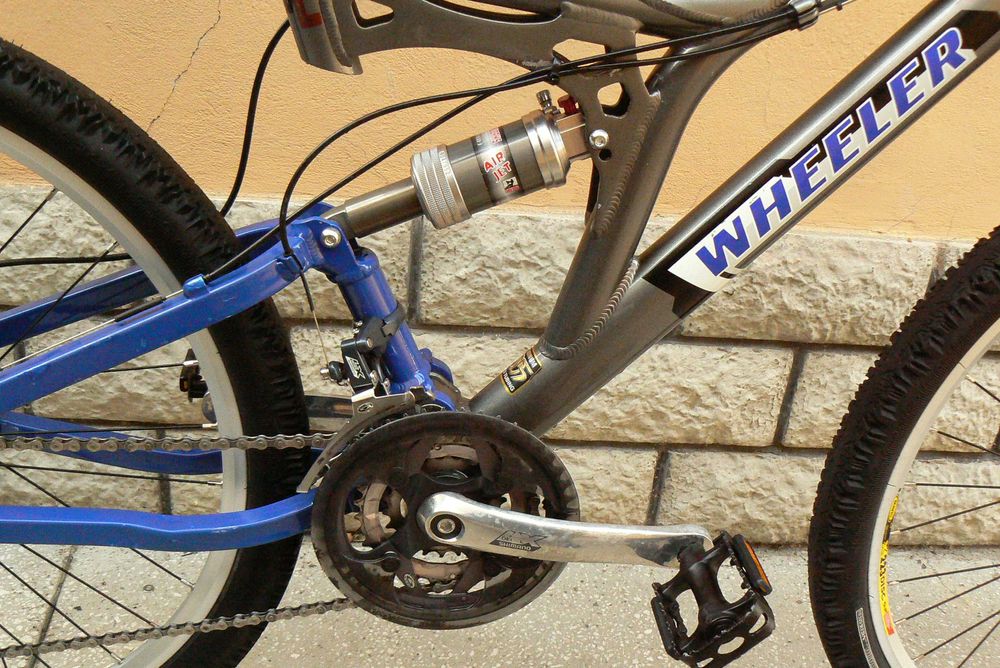 Bicicleta mountain bike full suspensie Wheeler