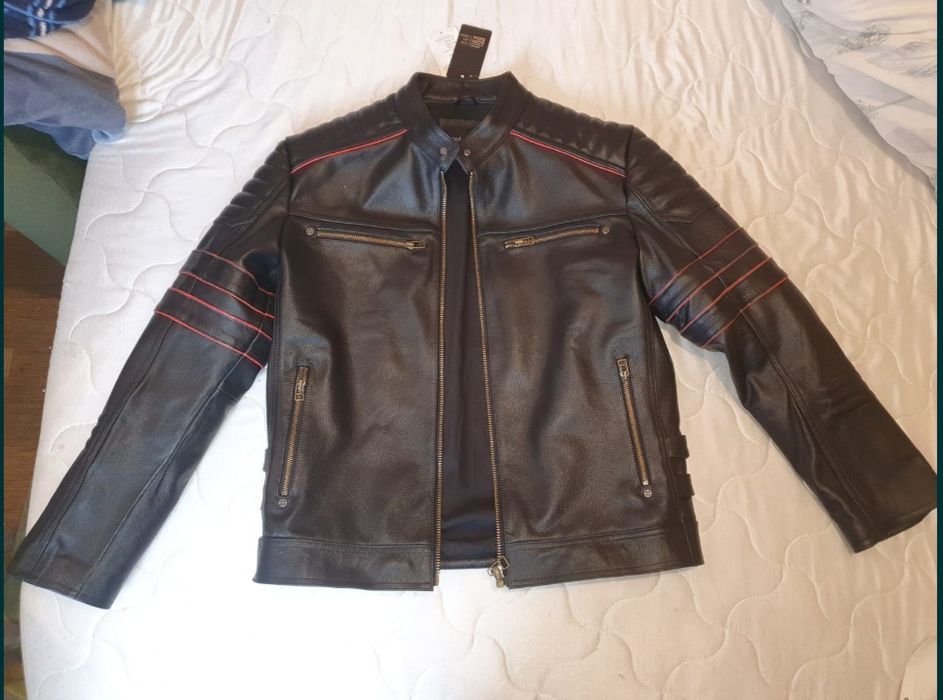 Новая кожаная куртка