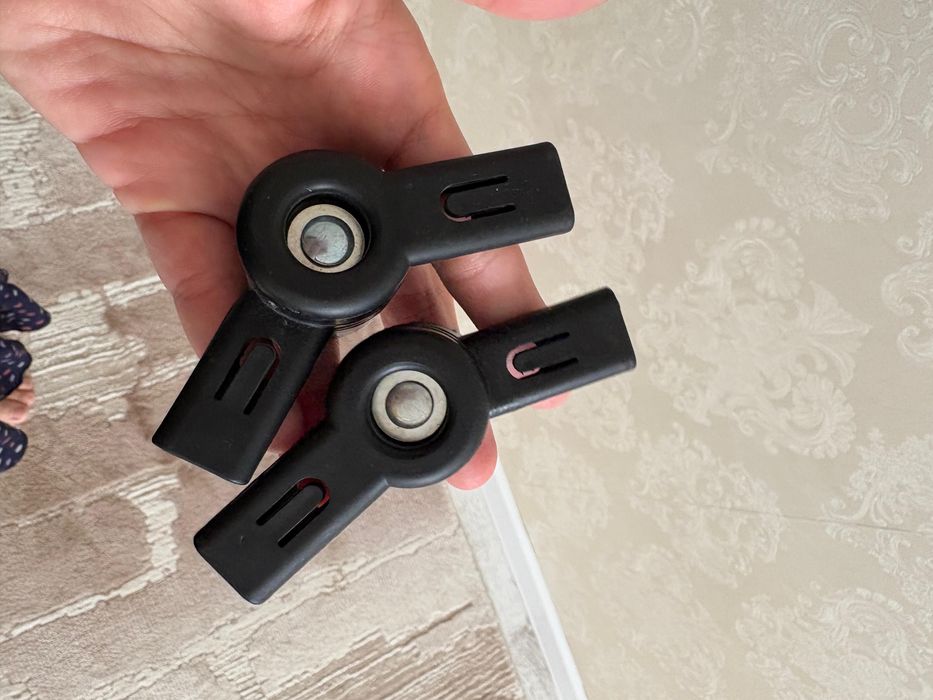 Регулятор капюшона коляски