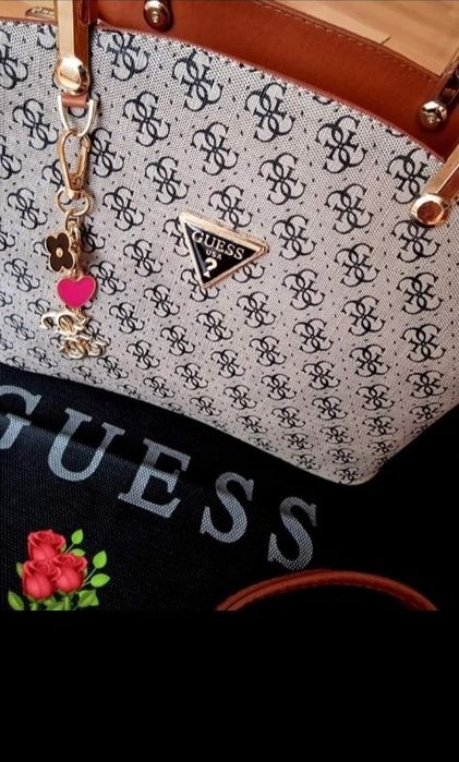 Geanta Guess new model import Italia, logo metalic, saculet