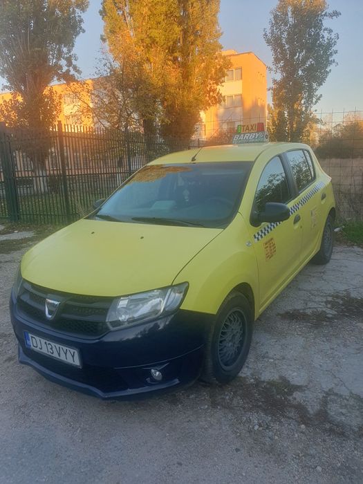 Logan taxi cu loc la operator
