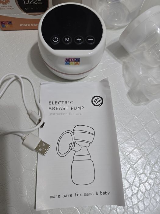 Электронный молокоотсос.