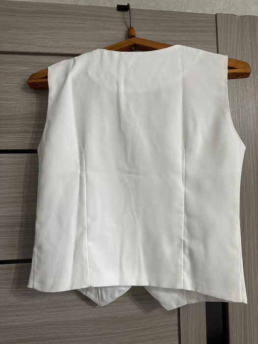 Жилетка женская