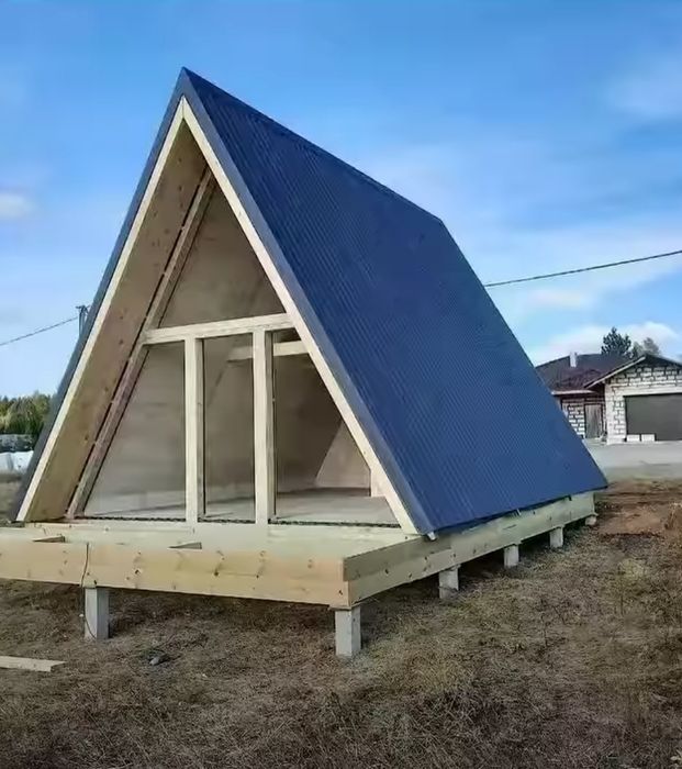 Casă  din lemn ,cabana A frame din lemn uscat .60 mp.