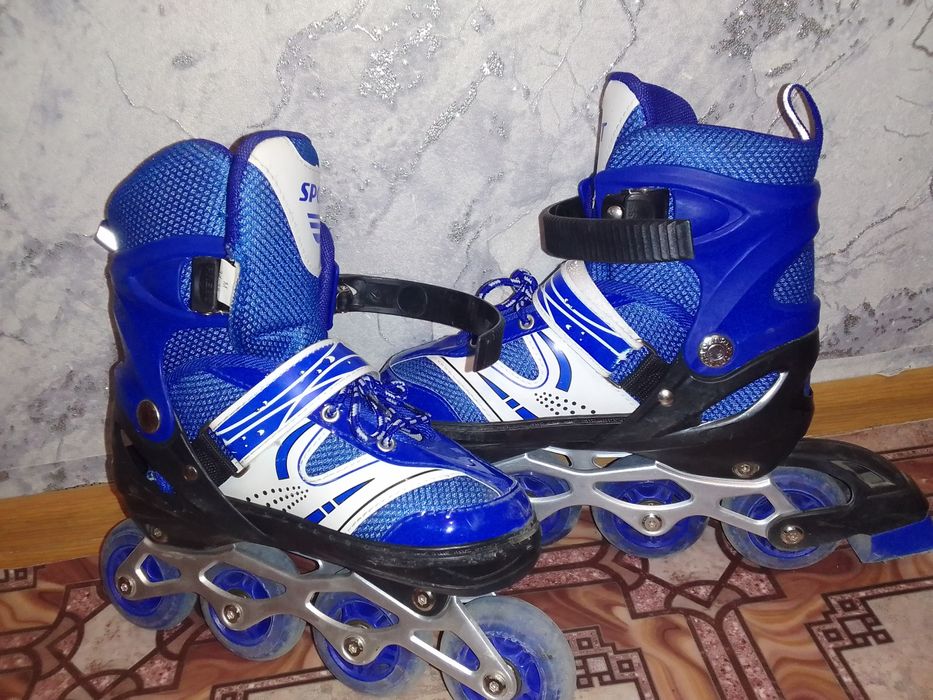 роликовые коньки