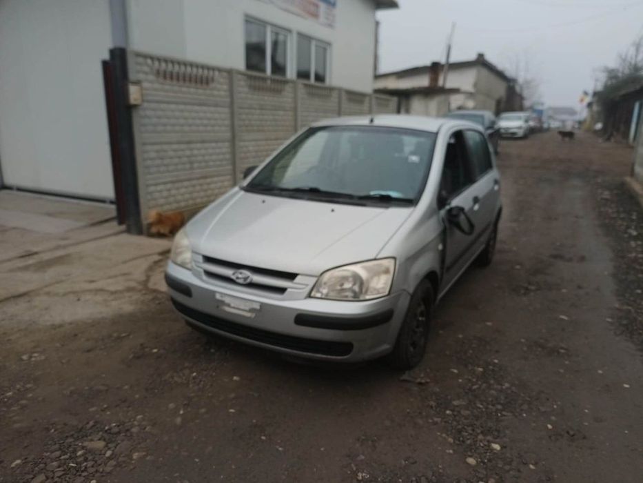Dezmembram Hyundai Getz 1.3 B usa fata dreapta/usa spate dreapta/bara spate
