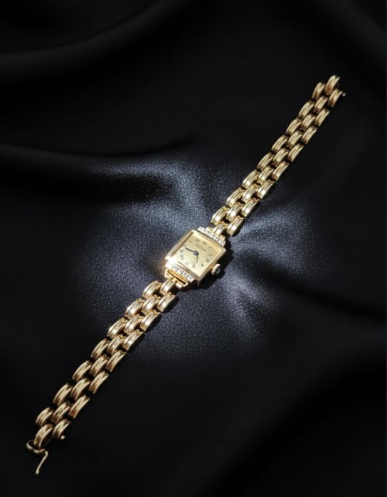 Продам бриллиантовые золотые часы