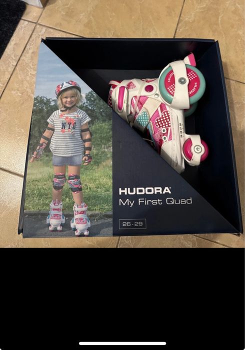 Patine cu rotile mărimi reglabile 26-29 - Roz, stare foarte buna.