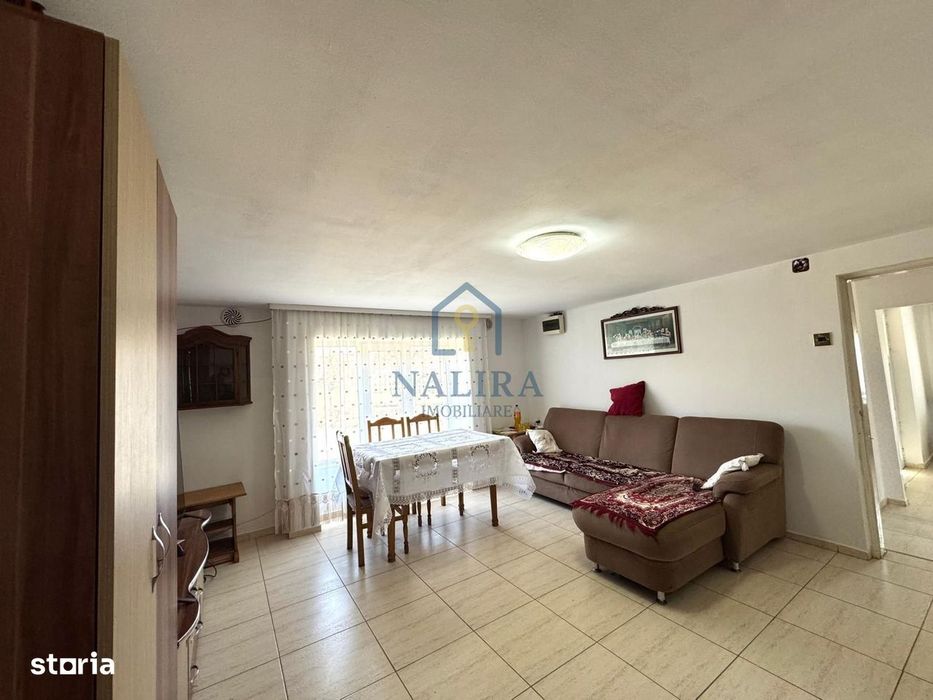 Casa de caramida de vanzare Surdesti cu teren intravilan 5000mp