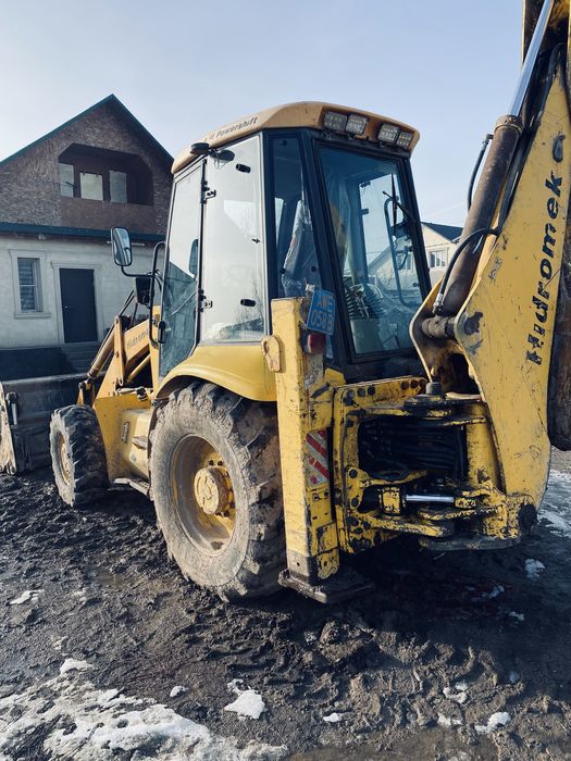 Услуги экскаватора-погрузчика