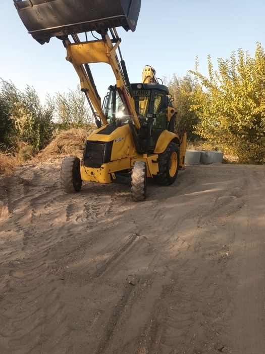 Йили 2011  моточасов 12000 new holland 330 миллон