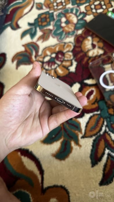Sotildi. iphone 12 pro gold