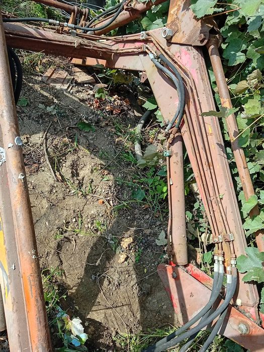 Încărcător frontal și suporți de prindere