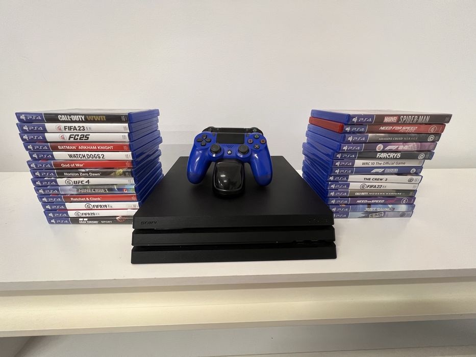 Pachet complet PlayStation 4 Pro 1TB – 26 jocuri + Logitech G29 + Stand + 2 controllere