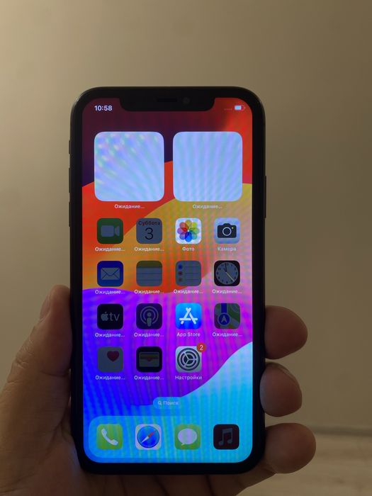 iPhone 11 на 128 GB в классическом чёрном цвете.