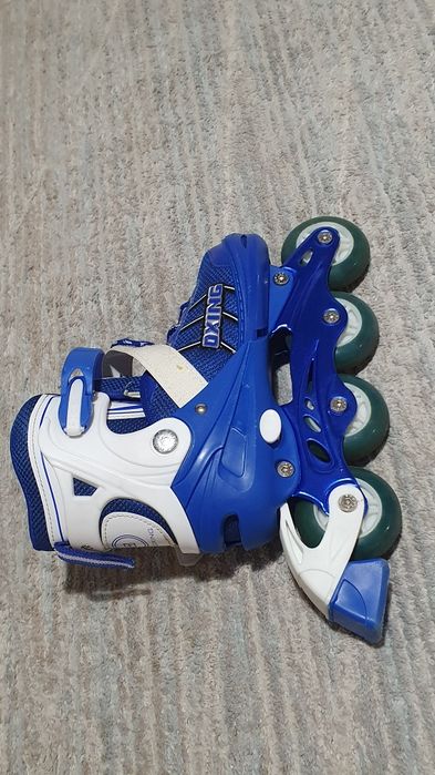 Роликовые коньки