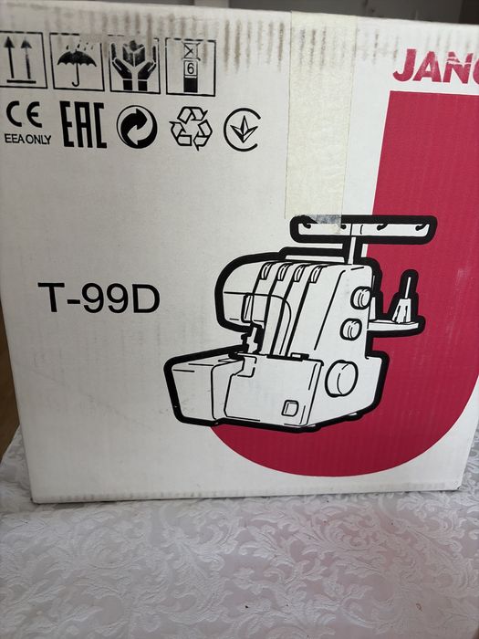 Оверлок машинка T-99D Janome