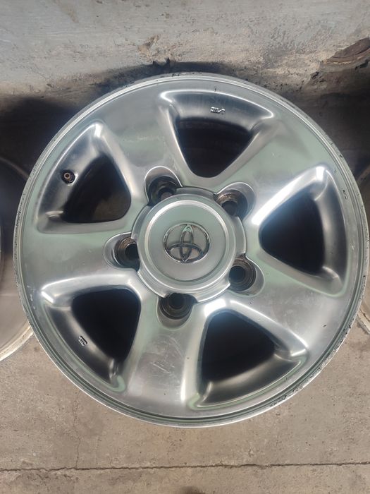 Продам  16 оригинальные диски на ланд Крузер 100