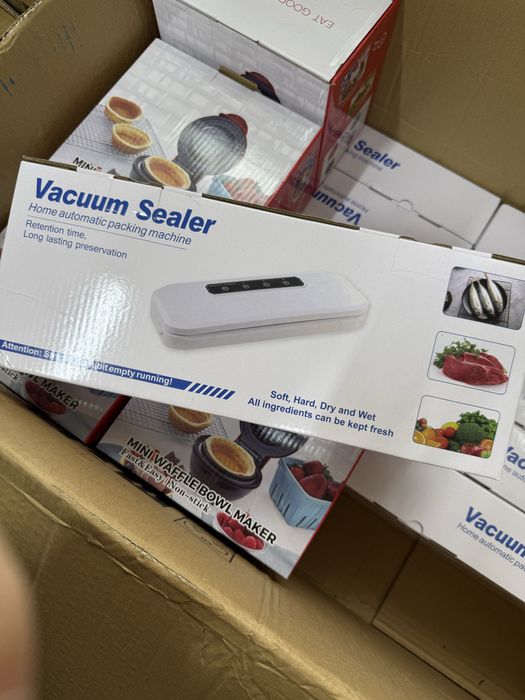 Вакуумный упаковщик