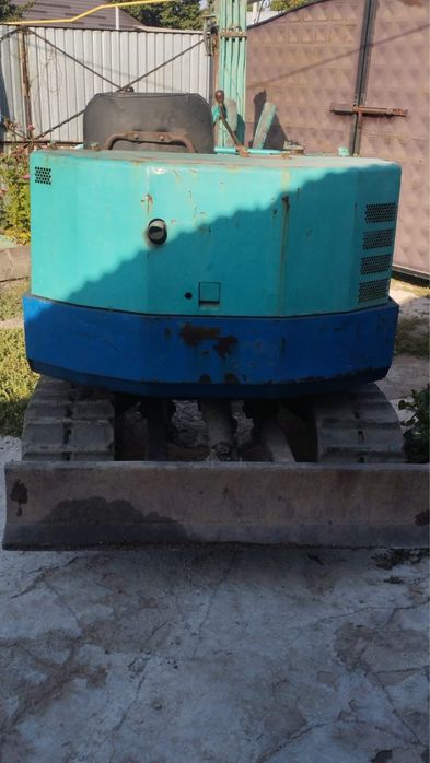 Японский миниэкскаватор Takeuchi TB