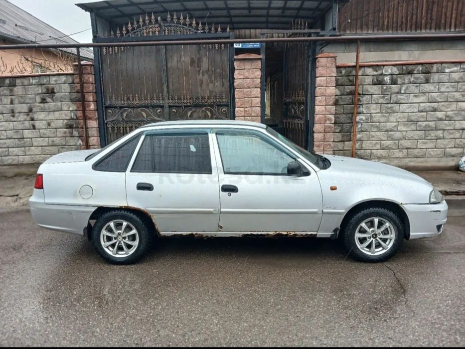 600 000    нексия  1,6 2011ж