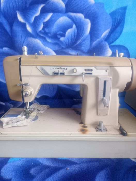 Mașină de cusut portabila