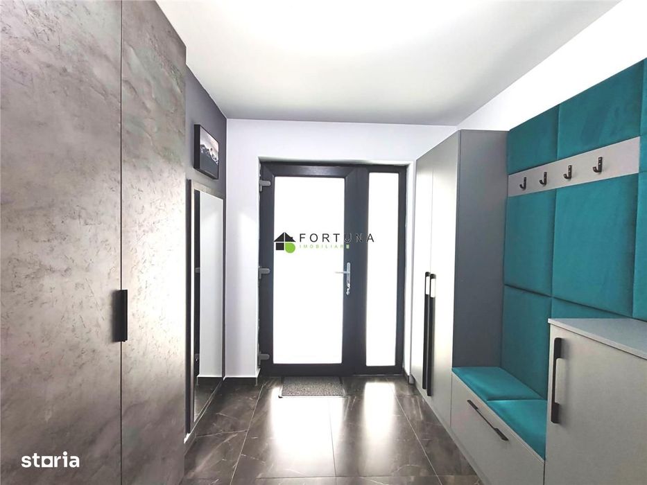 Casa moderna, singura in curte - Izvor