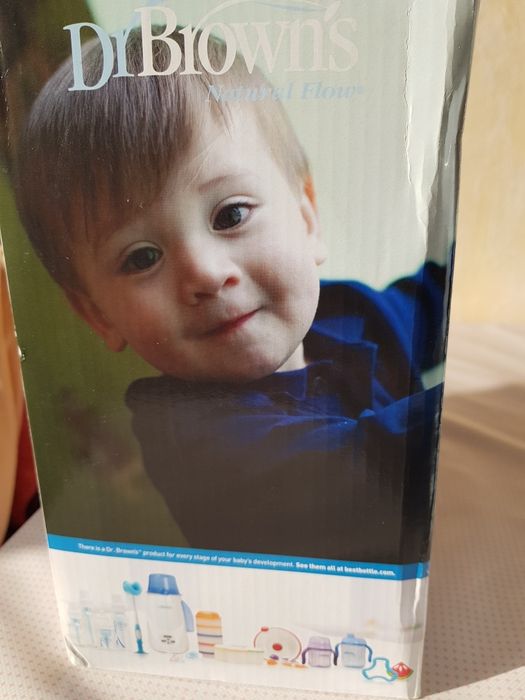 Уред за затопляне на бебешки бутилки