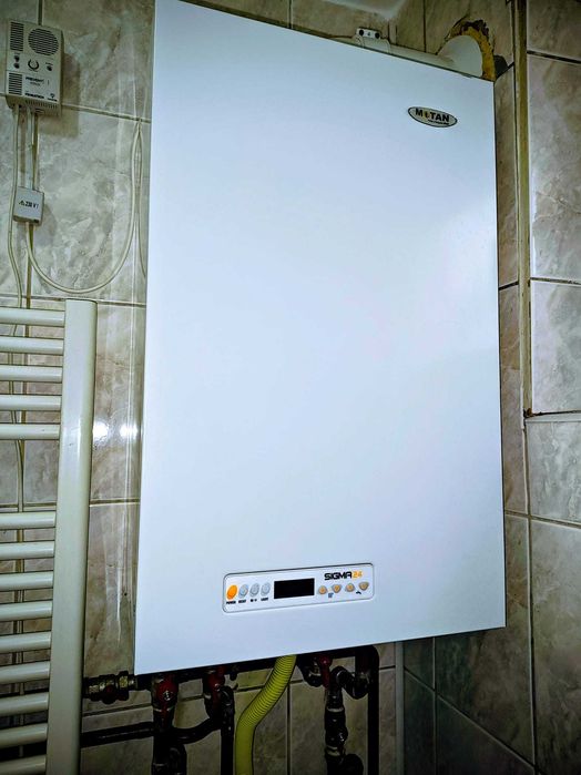 Vând 2 garsoniere unite, renovate, centrală proprie