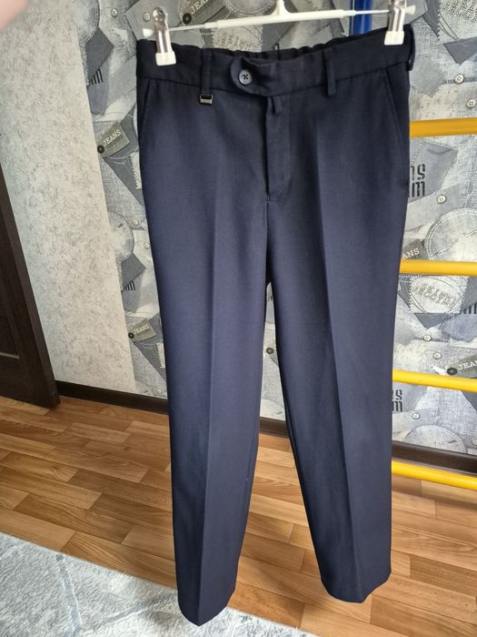 Продам школьные брюки Angelcher для мальчика