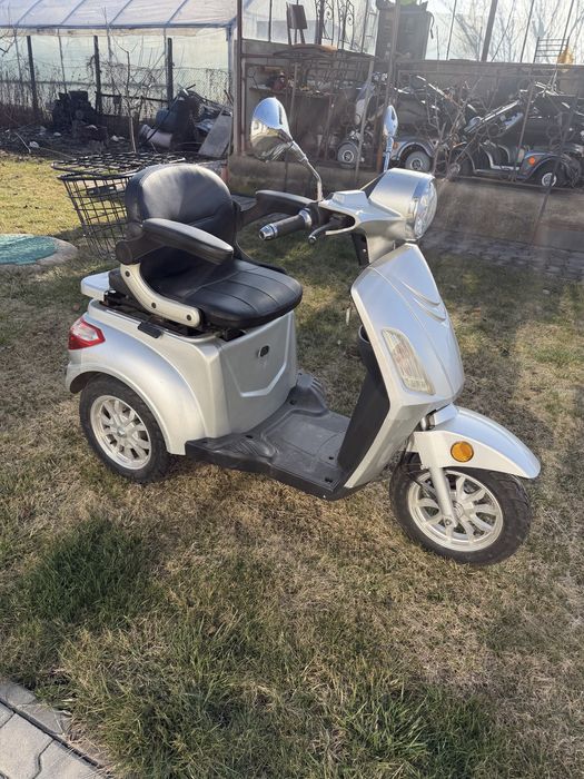 Tricicleta electrica scaun electric scuter electric carucior electric carut electric handicap dizabilitati batrani dezabilitati