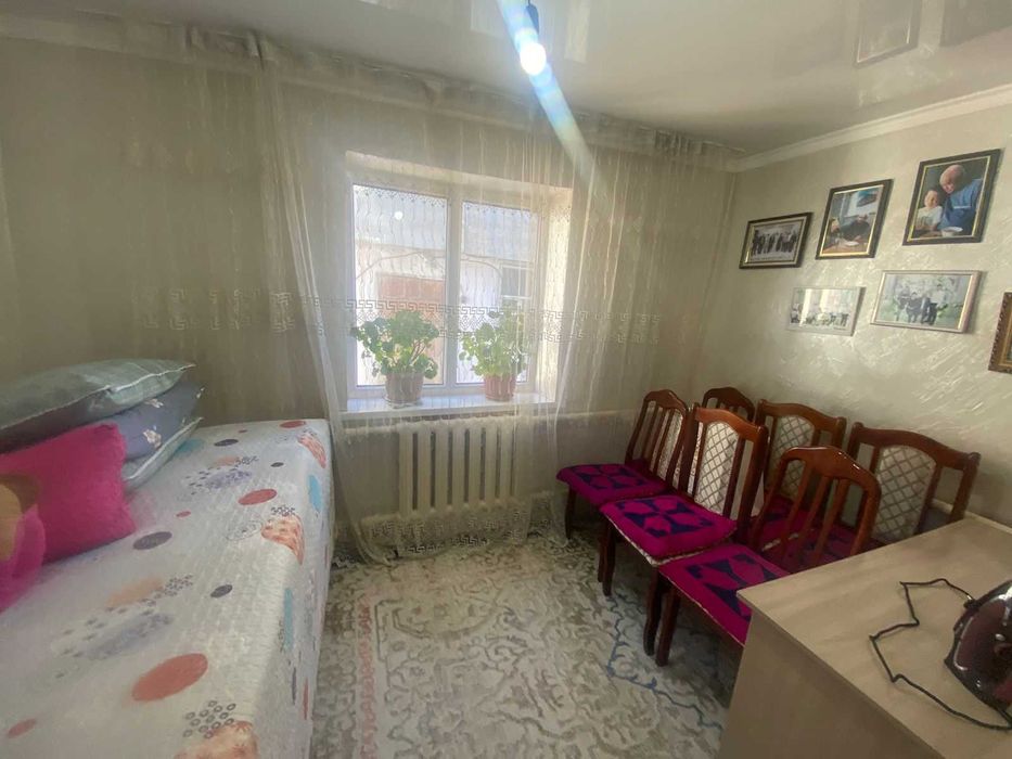 Дом на Бугре, Танат Империя