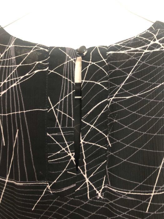 елегантен дамски топ DIKA