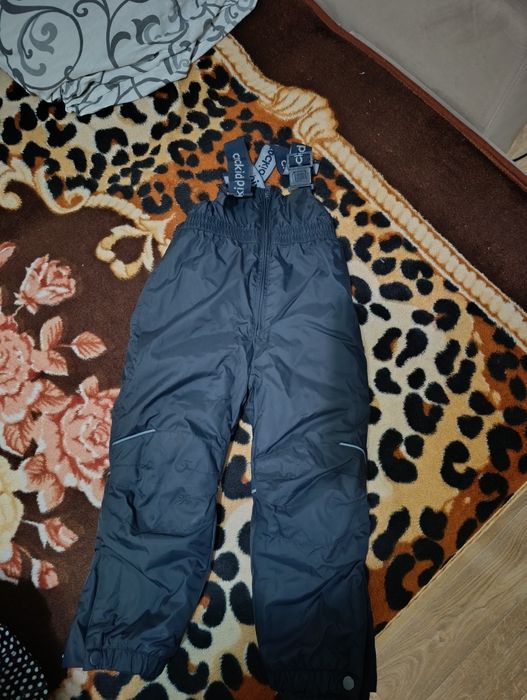 Продам полукомбез Крокид черного цвета размер 104-110