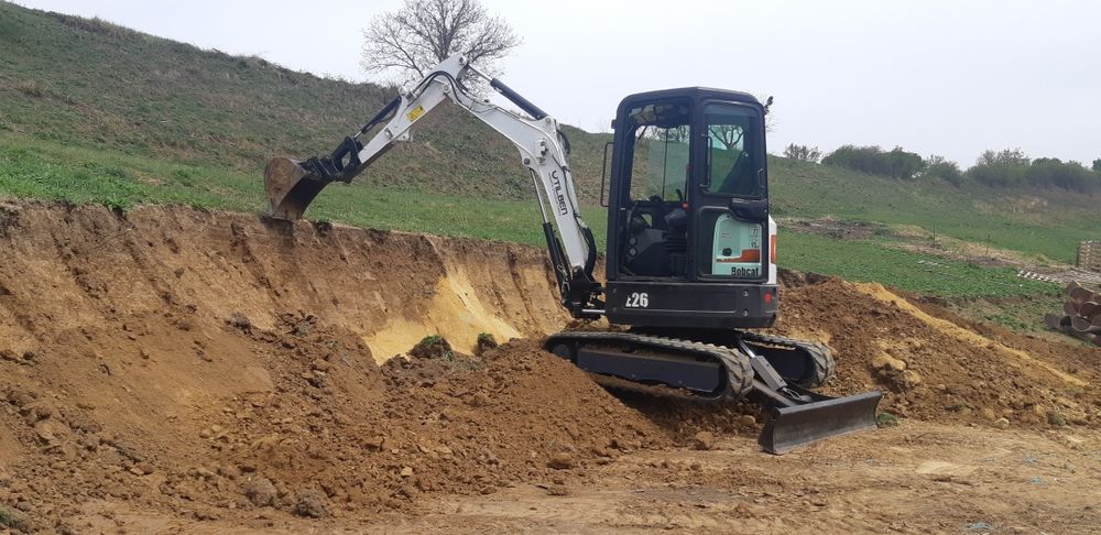 Servicii inchiriere excavator, bobcat, transport basculabil. inchiriat