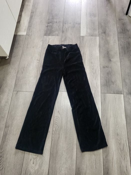 Vand pantaloni evazati
