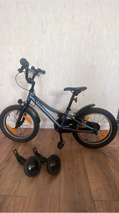 Продам детский велосипед на 4-7 лет