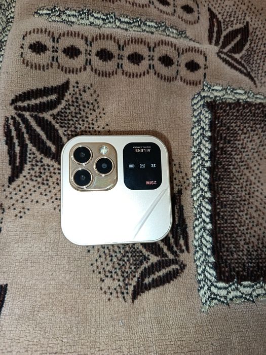 Кнопочный телефон